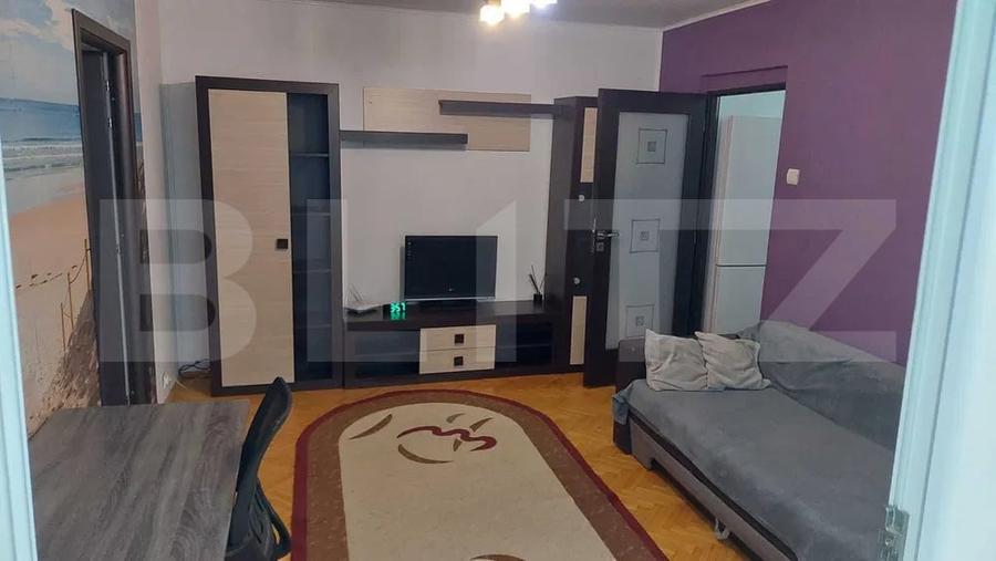 Apartament cu 2 camere semidecomandat, mobilat în Central