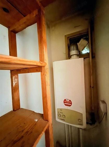 Apartament cu 3 camere semidecomandat în Podu Roș
