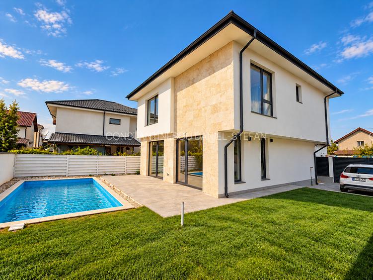 Casă 4 camere cu piscină, teren 400mp și încălzire în pardoseală