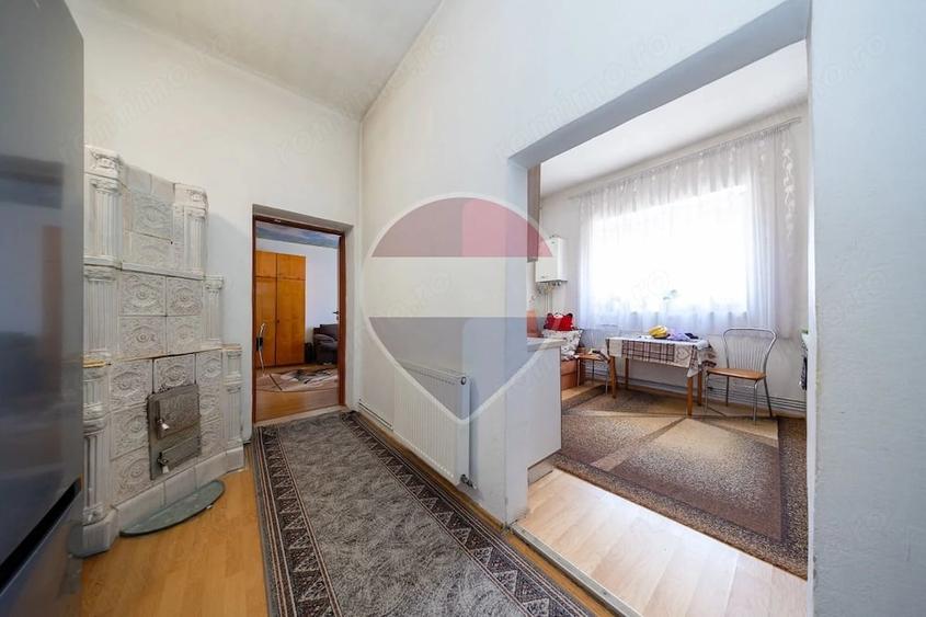 Casă cu Teren 1048 Mp în Satulung