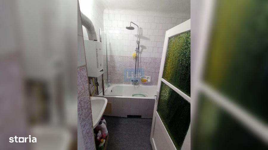 Casă cu 2 camere cu Teren 389 Mp în Central