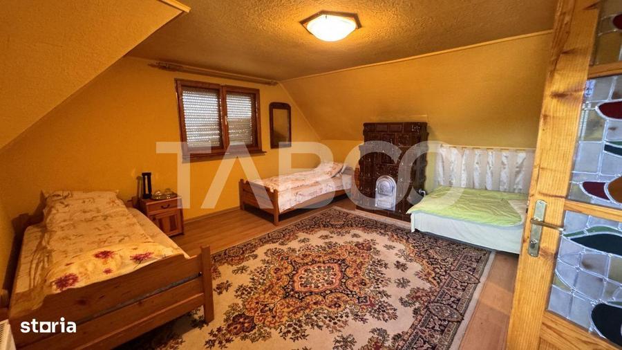 Casa de vanzare 6 camere loc de relaxare garaj teren 669 mp Cornatel - 9
