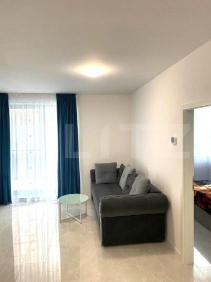 Apartament cu 2 camere semidecomandat, mobilat în Chinteni