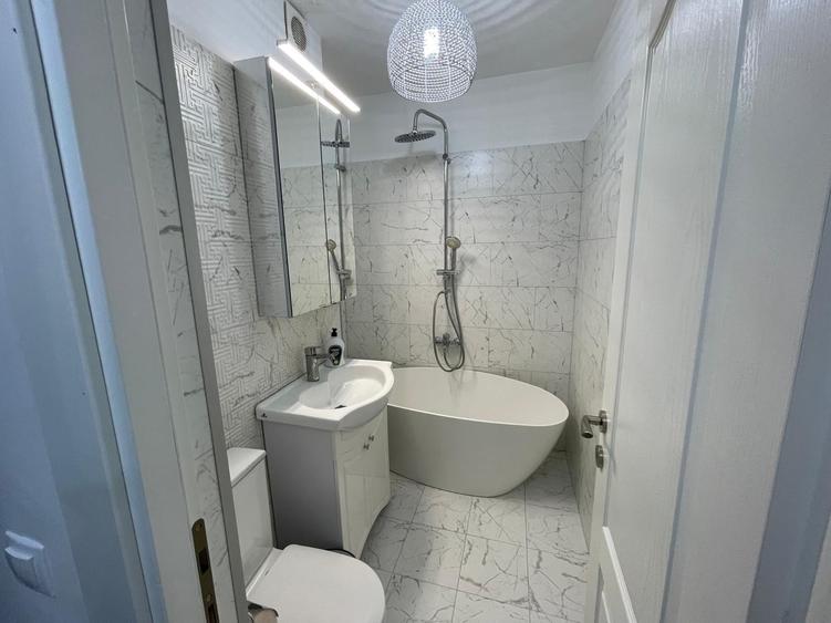 Apartament cu 2 camere semidecomandat, mobilat în P-ța Victoriei