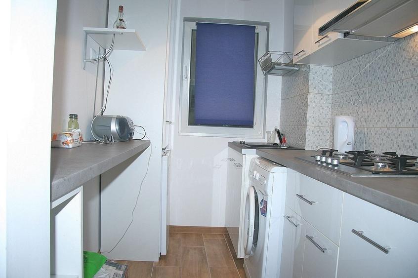 Apartament cu 2 camere semidecomandat, mobilat în Centrul Civic