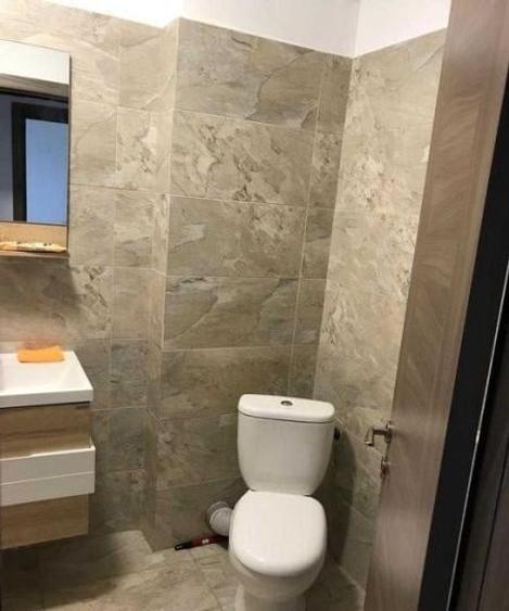 Apartament cu 2 camere semidecomandat, mobilat în Regie