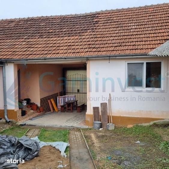 Casă cu 5 camere cu Teren 1611 Mp în Răbăgani