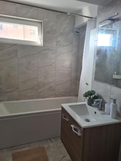 Apartament cu 2 camere decomandat în Cățelu
