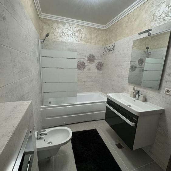 Apartament cu 2 camere semidecomandat, mobilat în Tractorul