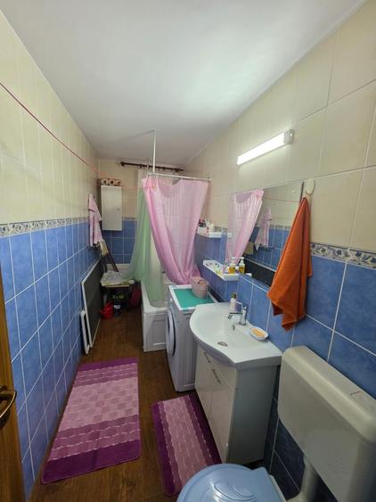 Garsonieră decomandată în Titan