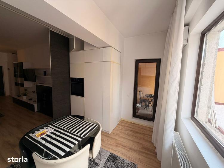 Apartament cu 2 camere semidecomandat, mobilat în P-ța Alba Iulia