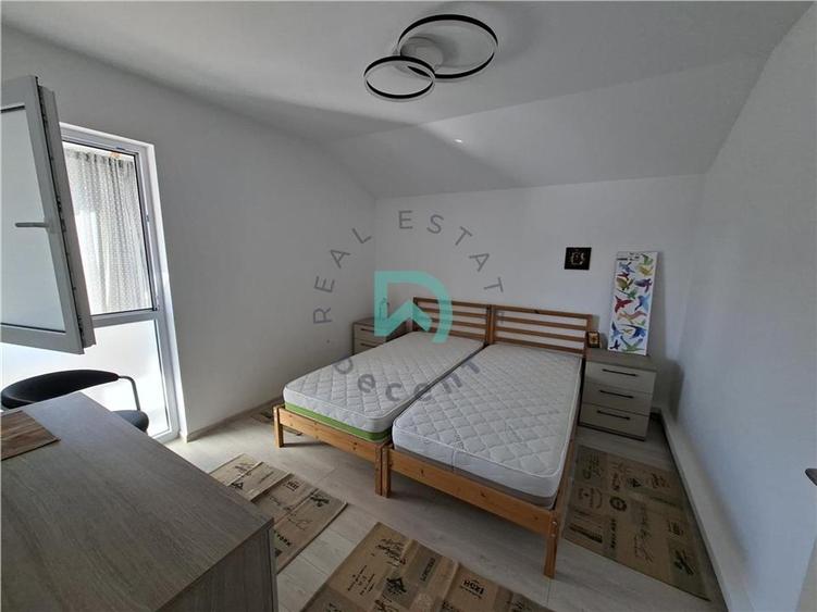 Apartament cu 4 camere decomandat în Tractorul