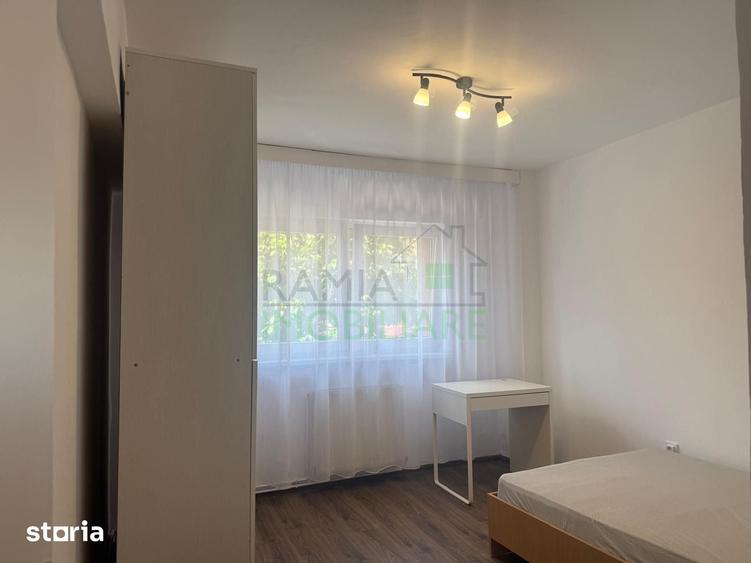 Apartament cu 3 camere decomandat în Tractorul
