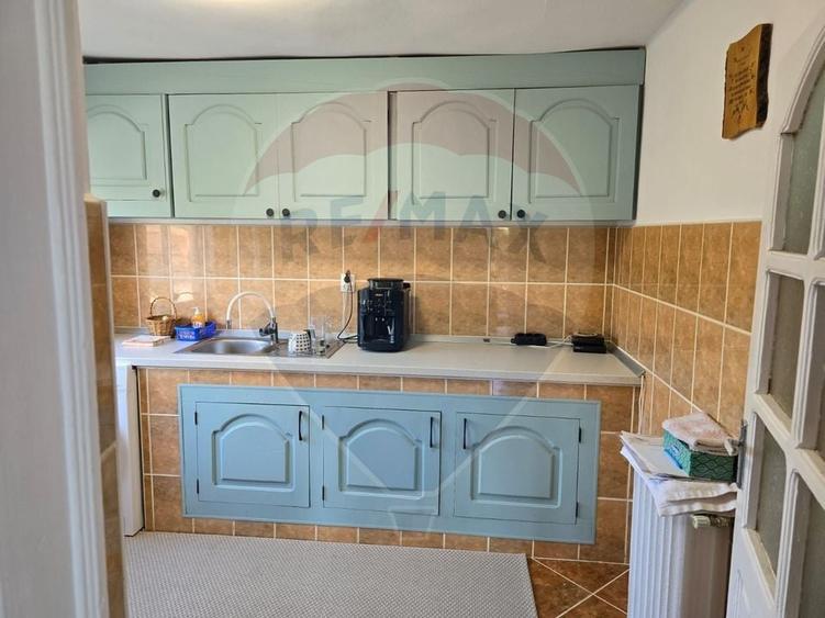 Casă cu 4 camere cu Teren 1000 Mp în Central