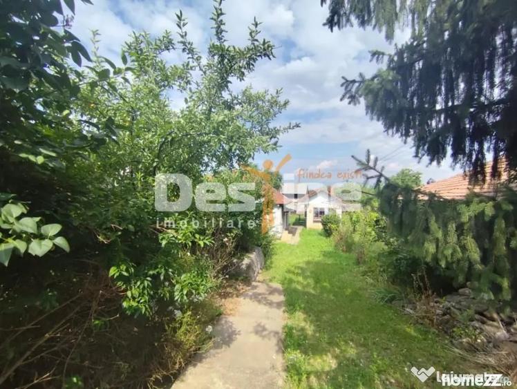 Casă cu 4 camere cu Teren 1075 Mp în Cătina