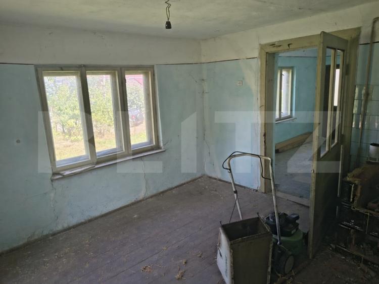 Casă cu 2 camere cu Teren 1200 Mp în Nord