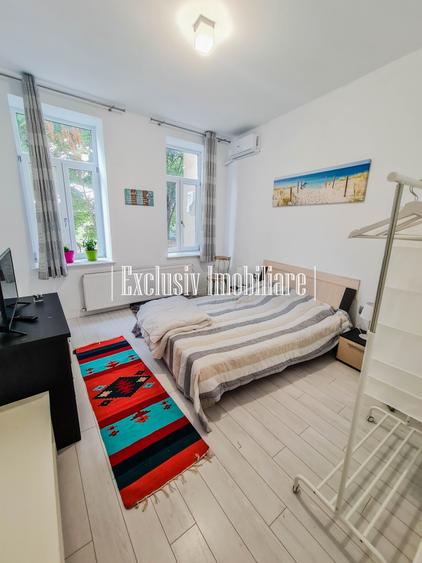 Apartament cu 3 camere semidecomandat, mobilat în Central