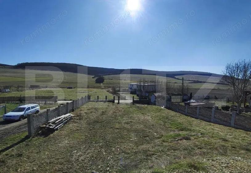 Casă cu Teren 1000 Mp în Tofalău