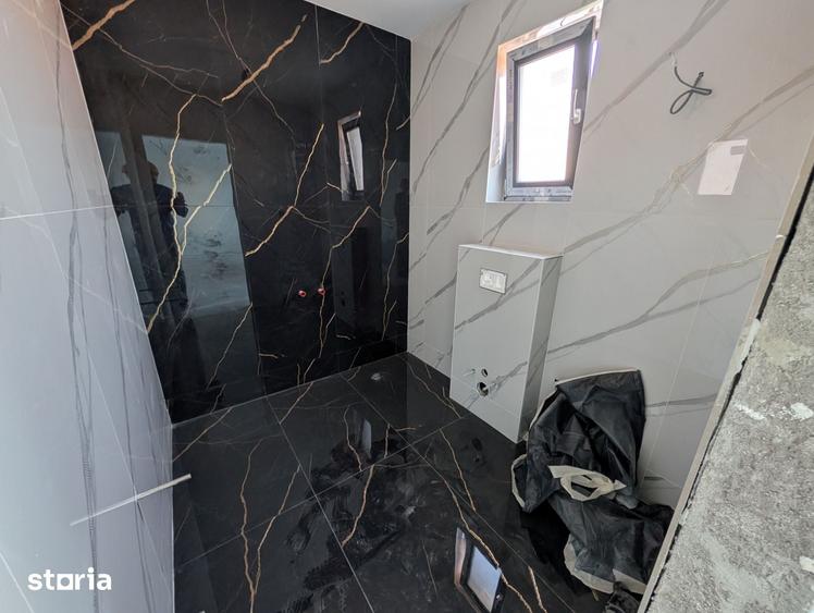 Casă cu 5 camere cu Teren 511 Mp în Tunari