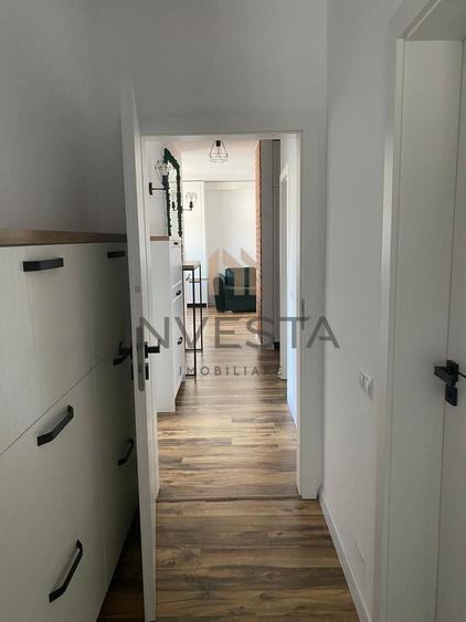 Apartament cu 3 camere semidecomandat, mobilat în Borhanci