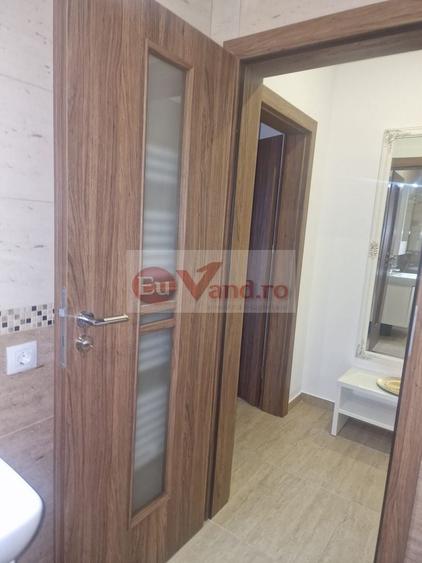 Apartament cu 2 camere semidecomandat, mobilat în Bd. Coșbuc