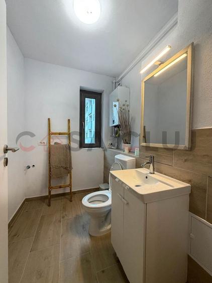 Apartament cu 3 camere semidecomandat, mobilat în Borhanci