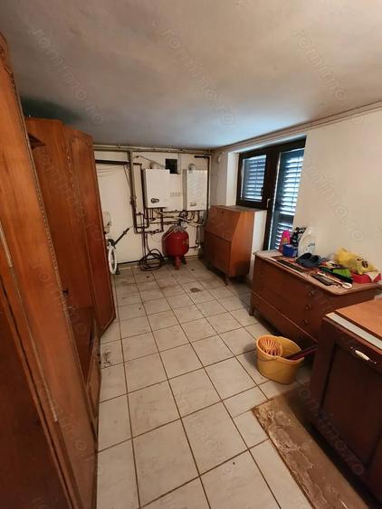 Casă cu Teren 800 Mp în Central