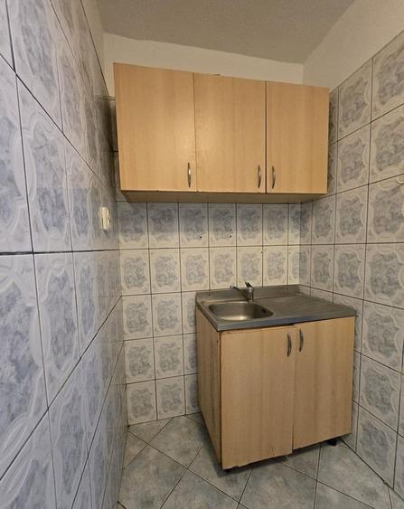 Garsonieră decomandată în Titan