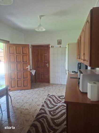 Casă cu 4 camere cu Teren 1000 Mp în Surani
