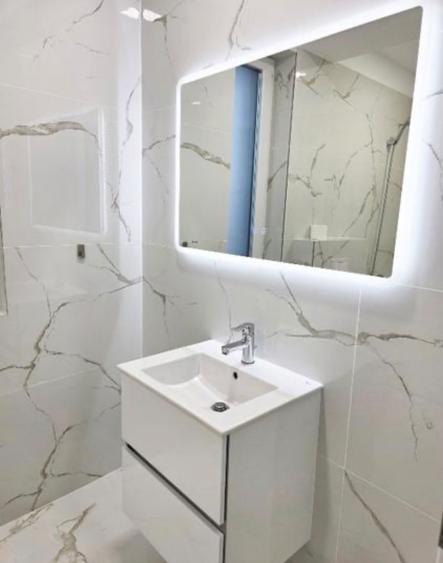 Casă cu 4 camere cu Teren 410 Mp în Tunari