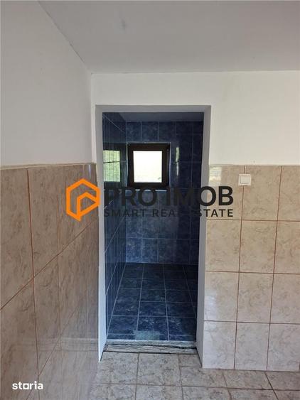 Casă cu 2 camere decomandat cu Teren 1180 Mp în Central