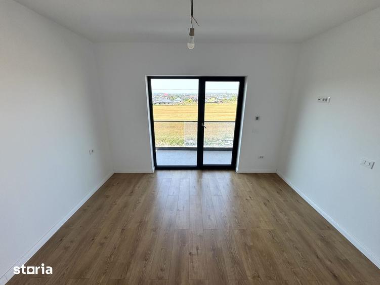 Casă cu 4 camere cu Teren 400 Mp în Holboca