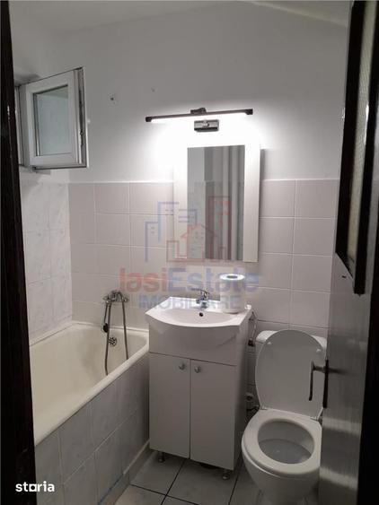 Apartament cu 2 camere semidecomandat în Podu Roș