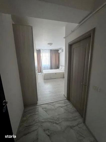 Garsonieră decomandată în Titan