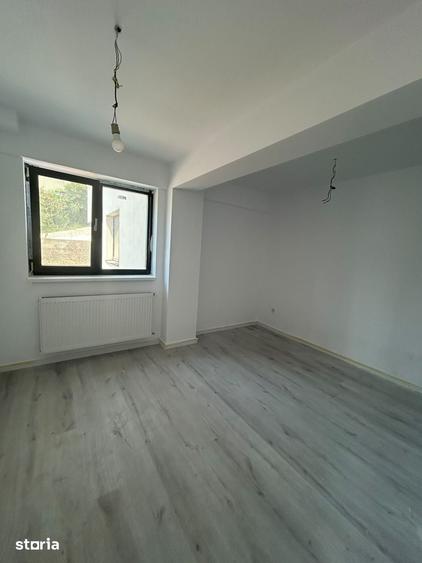 Apartament cu 3 camere în Podu Roș