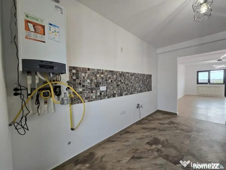 Casă cu 4 camere cu Teren 241 Mp în CET