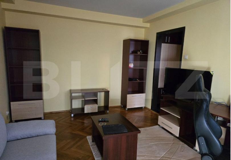 Apartament cu 2 camere semidecomandat, mobilat în Central