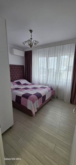 Apartament cu 3 camere decomandat în Titan
