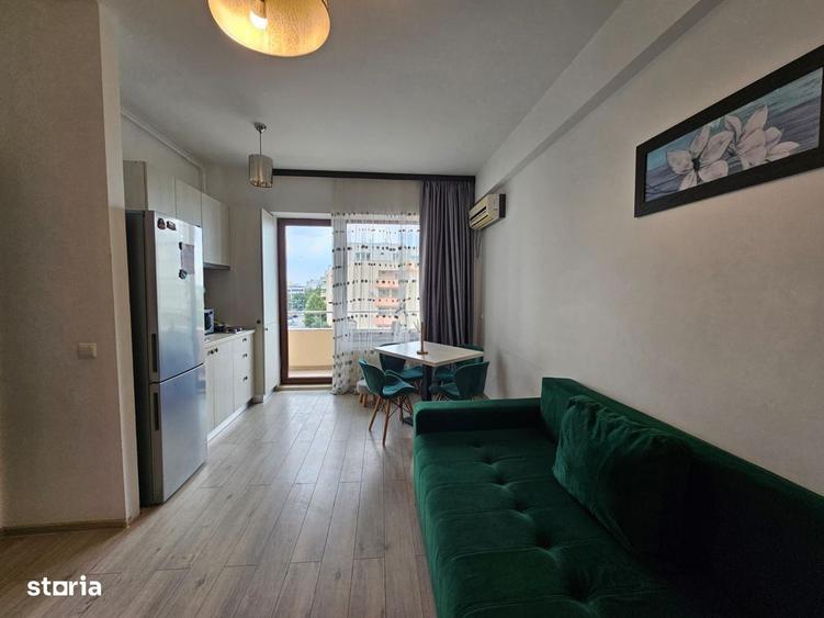 Apartament de vanzare in Summerland vedere laterala catre ac si mare - 7