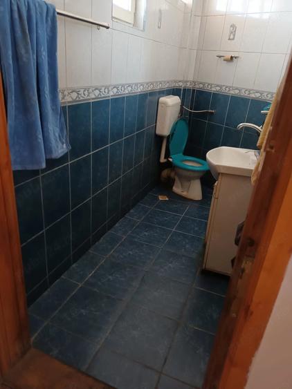 Casă cu Teren 1000 Mp în Central