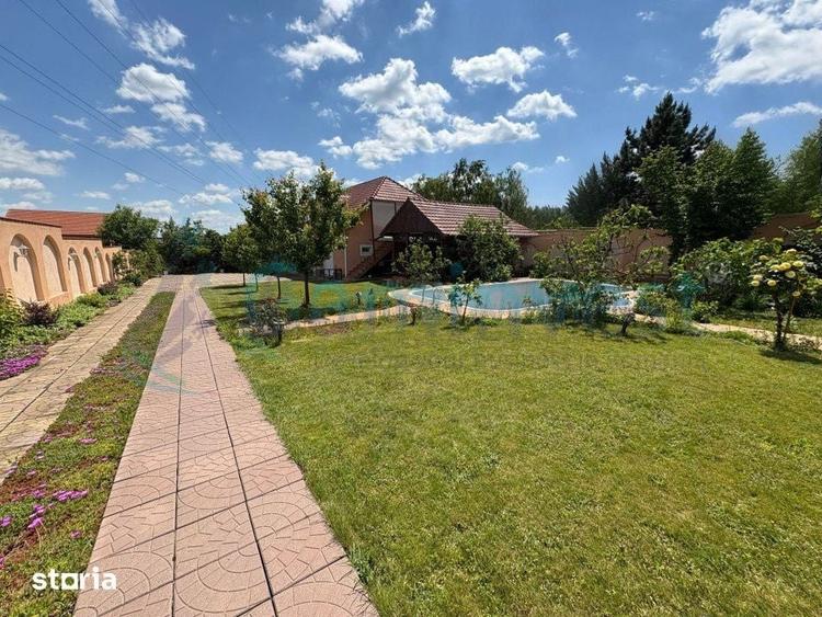 Casă cu Teren 3405 Mp în Sânmartin