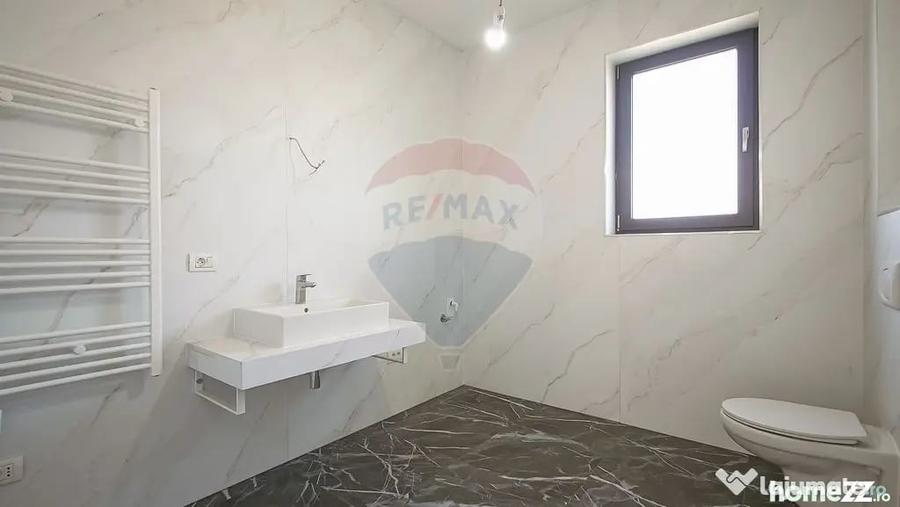 Casă cu 5 camere cu Teren 657 Mp în Hălchiu