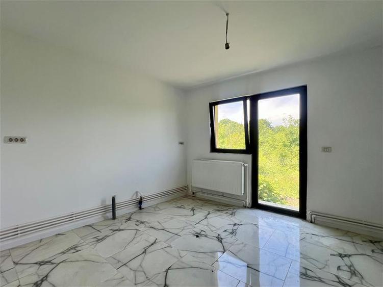 Casă individuală cu 4 camere cu Teren 600 Mp în Voinești