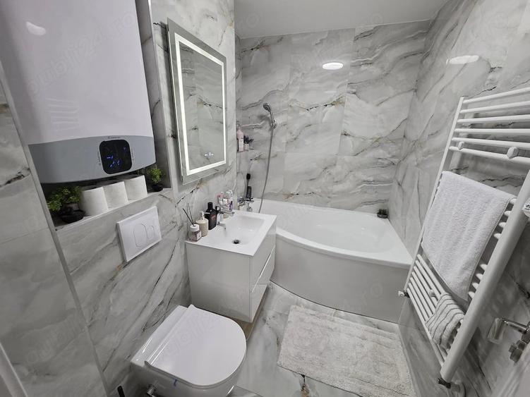 Apartament cu 4 camere decomandat în Central
