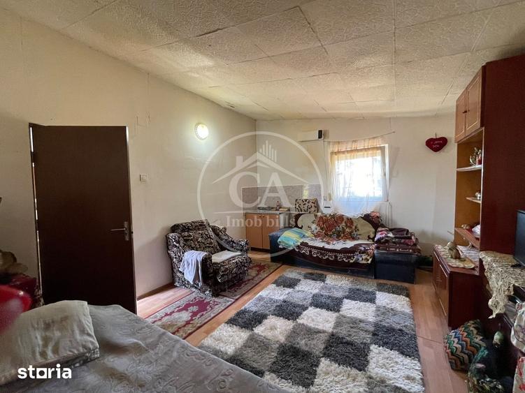 Casă cu 2 camere decomandat cu Teren 300 Mp în Husasău de Tinca