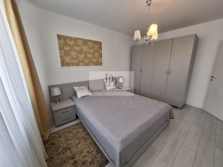 Apartament cu 2 camere semidecomandat, mobilat în Borhanci