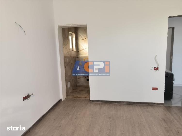 Casă cu 4 camere cu Teren 490 Mp în Adunații-Copăceni