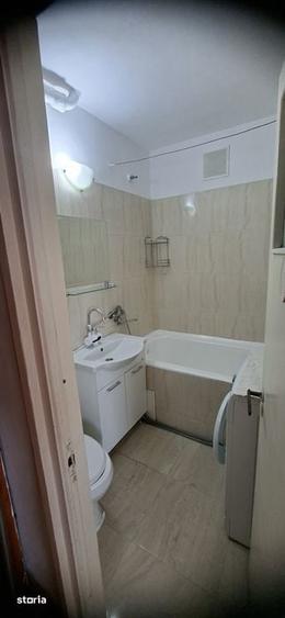 Apartament cu 3 camere în Podu Roș