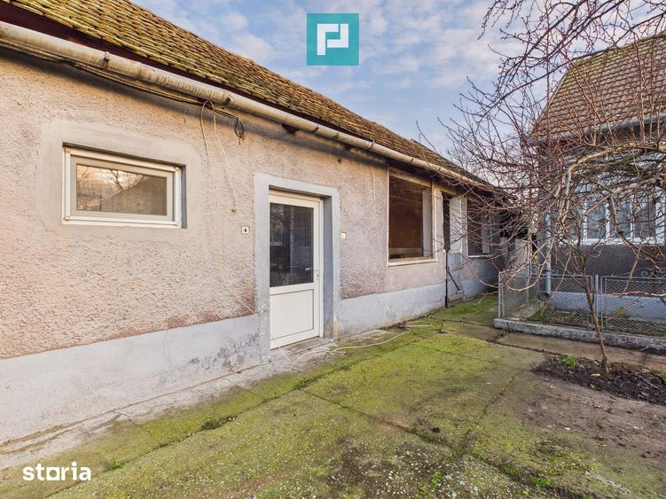 Casă cu 3 camere cu Teren 2800 Mp în Central