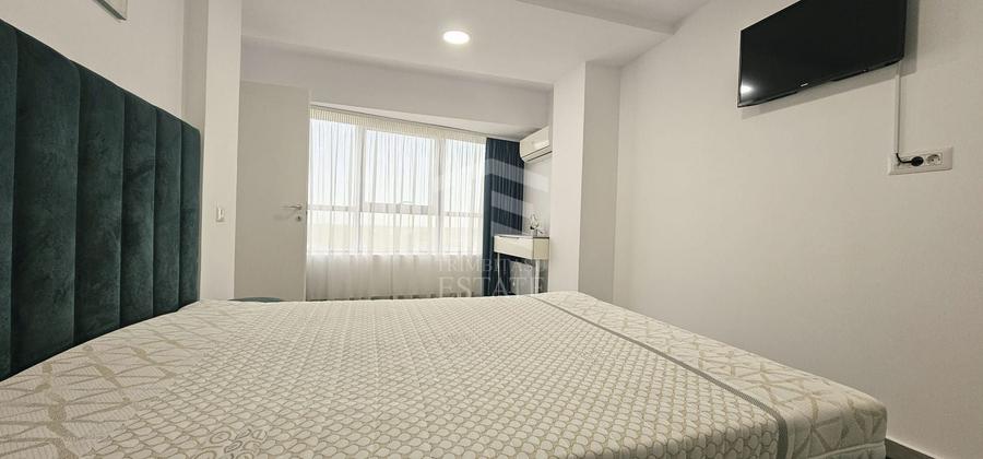 Apartament cu 3 camere semidecomandat, mobilat în Central